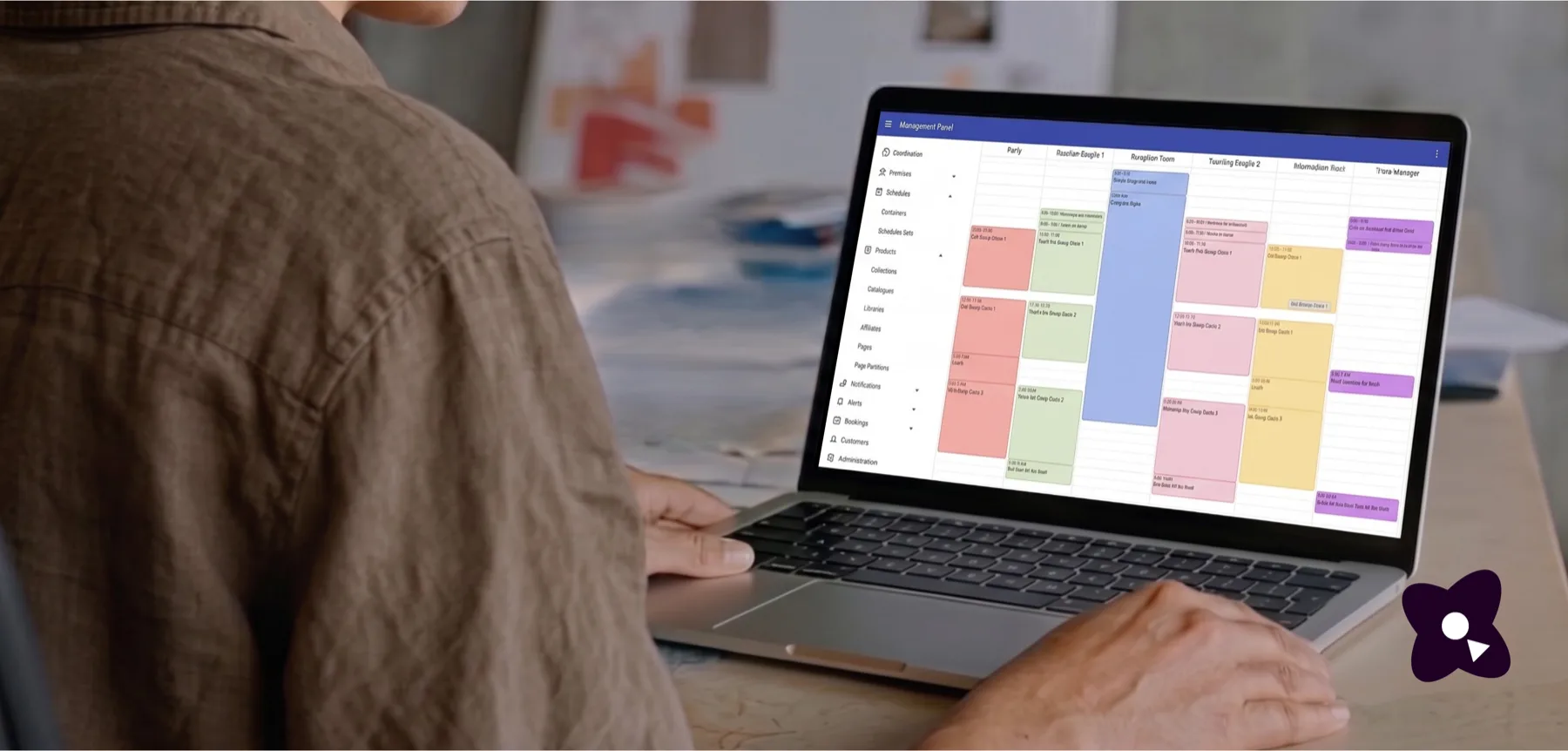 The Cothena management panel showing a colour-coded schedule of sessions across six tracks.